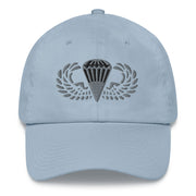 A light blue Basic Parachutist Hat with the logo on the front.  The hat has a curved visor and an adjustable strap at the back.