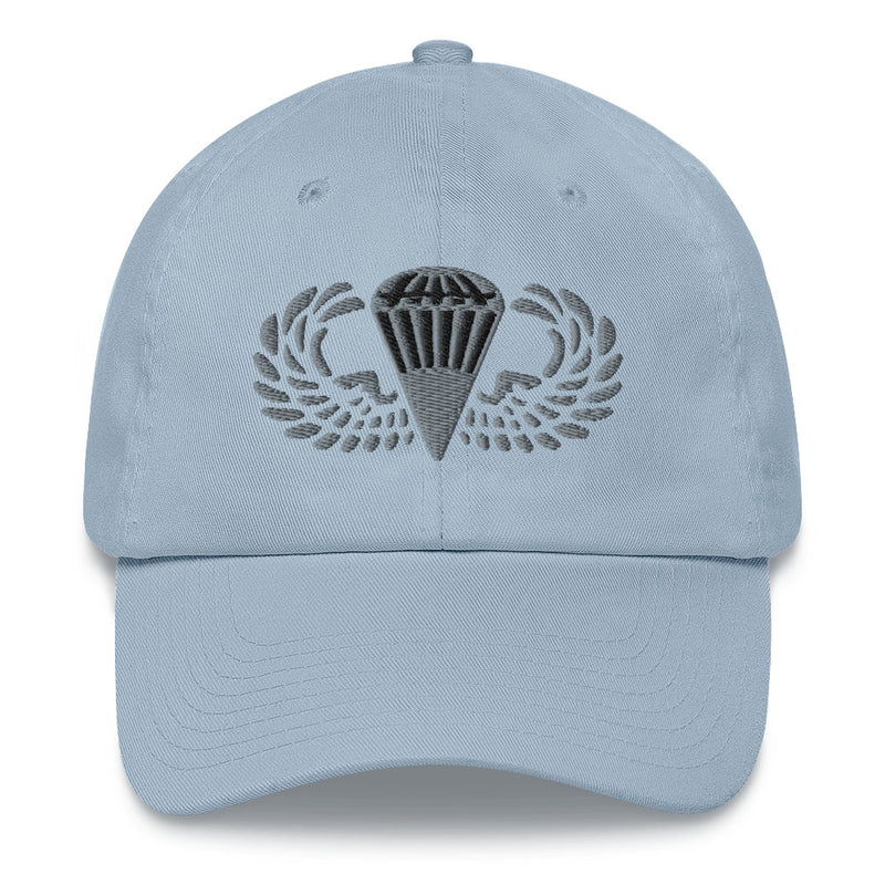 A light blue Basic Parachutist Hat with the logo on the front.  The hat has a curved visor and an adjustable strap at the back.