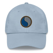A light blue 29th Infantry Division Hat with the logo on the front.  The hat has a curved visor and an adjustable strap at the back.