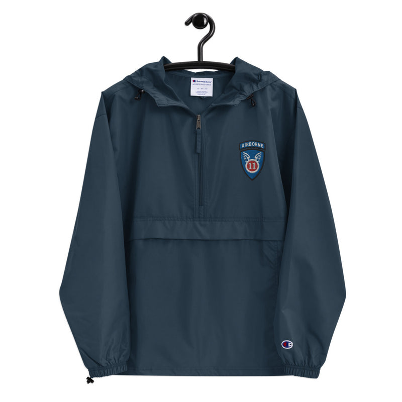 11th Airborne Division Navy Champion packable jacket with a detailed embroidered logo.