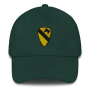 A spruce colored 1st Cavalry Division Hat with the logo on the front.  The hat has a curved visor and an adjustable strap at the back.