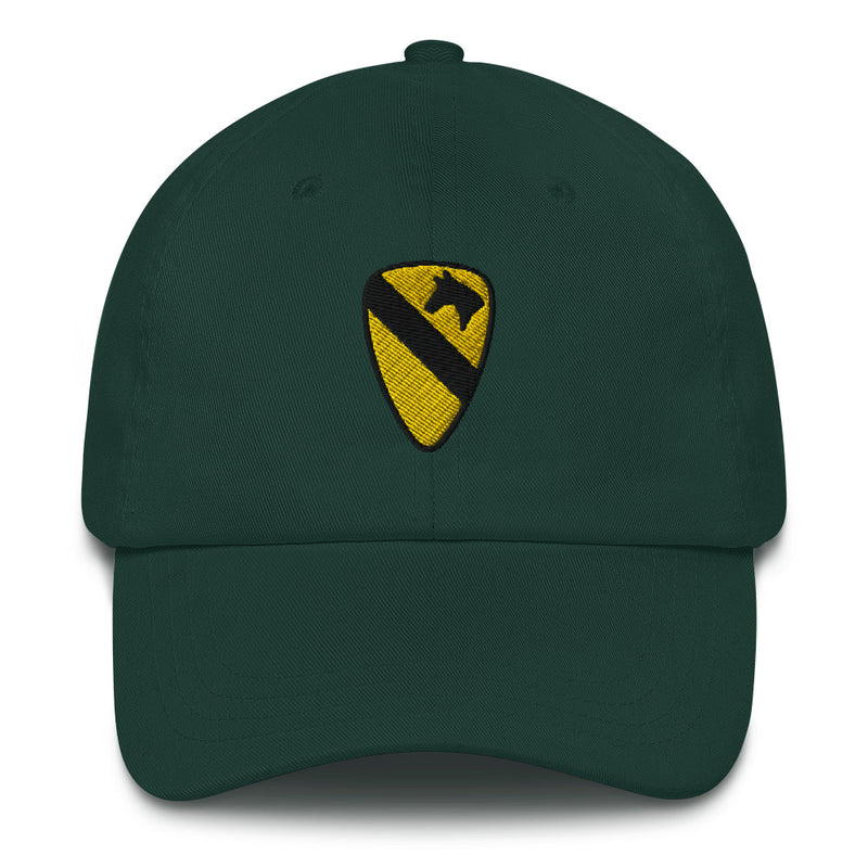 A spruce colored 1st Cavalry Division Hat with the logo on the front.  The hat has a curved visor and an adjustable strap at the back.