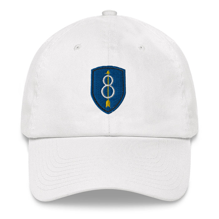 A white 8th Infantry Division Hat with the logo on the front.  The hat has a curved visor and an adjustable strap at the back.