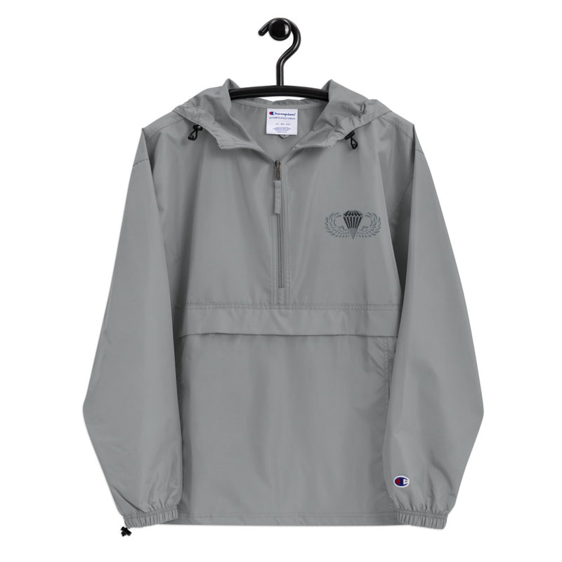 Basic Parachutist Graphite Champion packable jacket with a detailed embroidered logo.