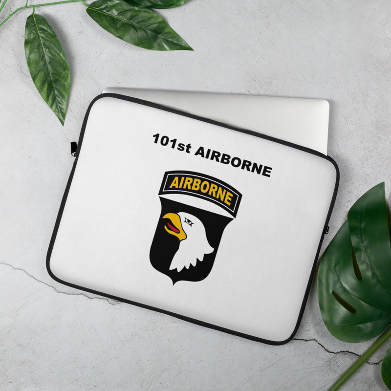 A lightweight and water-resistant white Laptop Sleeve with the 101st Airborne Division logo printed on top. The laptop sleeve is designed to fit a 15" laptop.