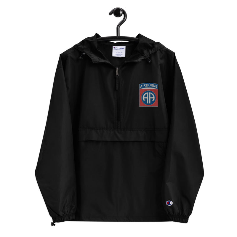 82nd Airborne Black Champion packable jacket with a detailed embroidered logo.