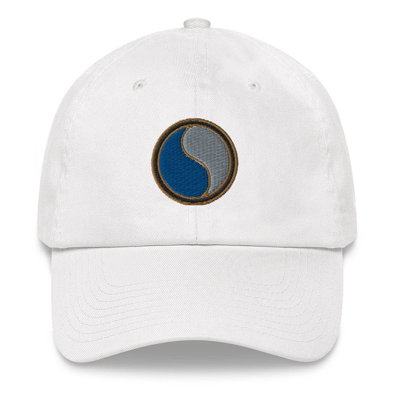 A white 29th Infantry Division Hat with the logo on the front.  The hat has a curved visor and an adjustable strap at the back.