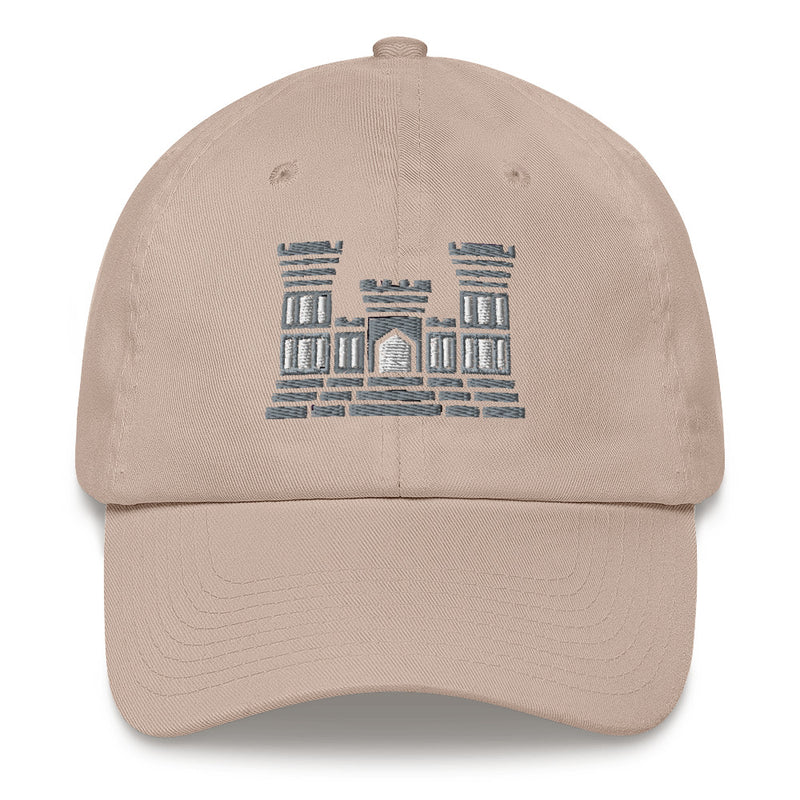 A stone colored Combat Engineer Hat with the logo on the front.  The hat has a curved visor and an adjustable strap at the back.