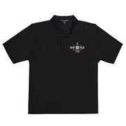 "I Broke 70" - Black Golf shirt • 65% polyester, 35% cotton pique • Relaxed fit that runs large • Flat knit collar and cuffs