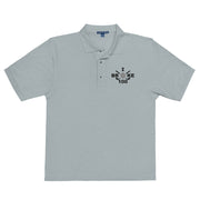 "I Broke 100" - Cool Heather Golf shirt • 65% polyester, 35% cotton pique • Relaxed fit that runs large • Flat knit collar and cuffs