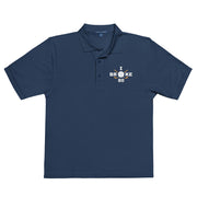 "I Broke 80" - Navy Golf shirt • 65% polyester, 35% cotton pique • Relaxed fit that runs large • Flat knit collar and cuffs