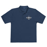 "I Broke 90" - Navy Golf shirt • 65% polyester, 35% cotton pique • Relaxed fit that runs large • Flat knit collar and cuffs