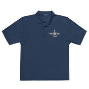 "I Broke 100" - Navy Golf shirt • 65% polyester, 35% cotton pique • Relaxed fit that runs large • Flat knit collar and cuffs