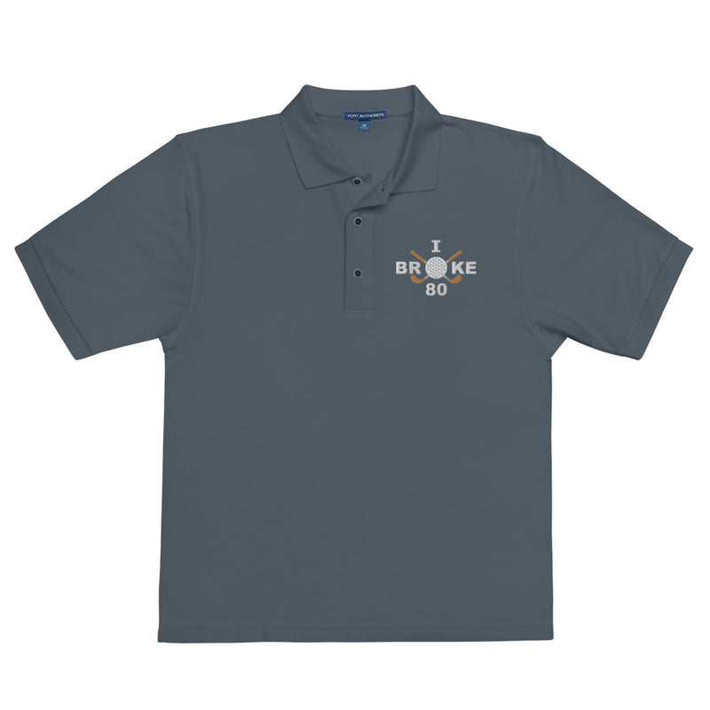 "I Broke 80" - Steel Grey Golf shirt • 65% polyester, 35% cotton pique • Relaxed fit that runs large • Flat knit collar and cuffs