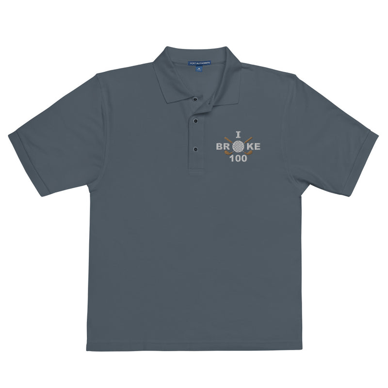 "I Broke 100" - Steel Grey Golf shirt • 65% polyester, 35% cotton pique • Relaxed fit that runs large • Flat knit collar and cuffs