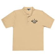 "I Broke 100" - Stone Colored Golf shirt • 65% polyester, 35% cotton pique • Relaxed fit that runs large • Flat knit collar and cuffs