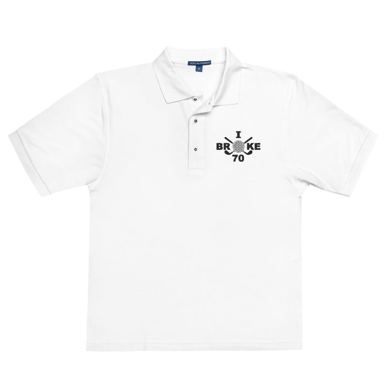 "I Broke 70" - White Golf shirt • 65% polyester, 35% cotton pique • Relaxed fit that runs large • Flat knit collar and cuffs