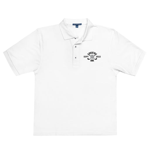The Printful Golf Shirt - Hole in One with Personalized Month and Year Men's Polo is a white short-sleeve men's polo with a collar, three buttons, and a custom black bell graphic on the chest featuring "SEPT" and "2022.