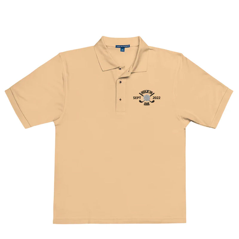 "Hole in One with Personalized Month and Year" - Stone Colored Golf shirt • 65% polyester, 35% cotton pique • Relaxed fit that runs large • Flat knit collar and cuffs